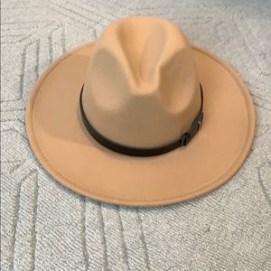 Never worn tan brown wide brim hat